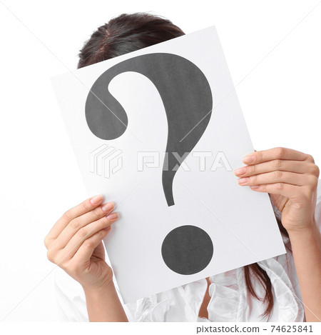 closeup.young woman showing a question mark. 74625841