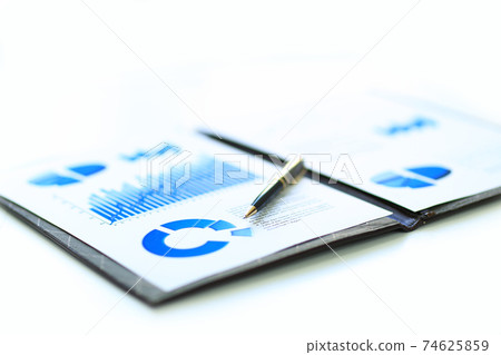 business report with the financial and marketing schedules and handle workplace businessman business report with the financial and marketing schedules and handle workplace businessman 74625859