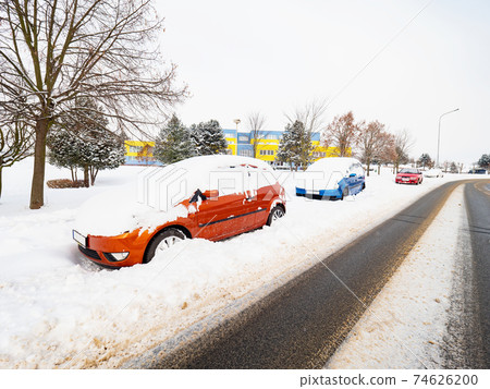 Extreme snow after night snow strom. Parked cars covered snow Extreme snow after night snow strom. Parked cars covered snow 74626200