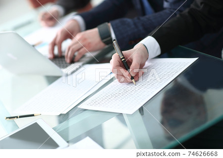 business team prepares the budget of the new project 74626668