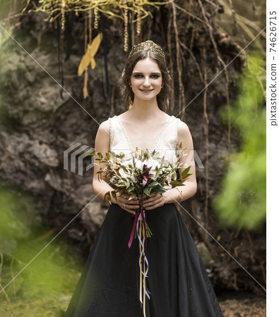 bride with bouquet on background of nature bride with bouquet on background of nature 74626715