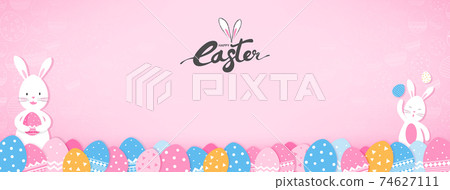 Cute bunnies and colorful Easter eggs on pink banner background 74627111
