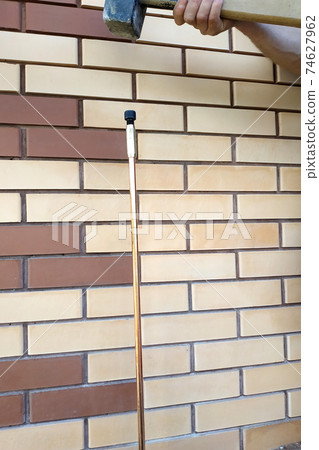 The process of grounding electrical installations and devices, mounting a copper tube. The process of grounding electrical installations and devices, mounting a copper tube. 74627962