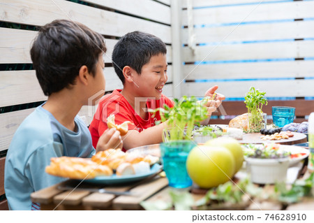 Children having a birthday party with their friends Children having a birthday party with their friends 74628910