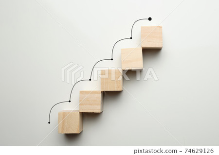 Growth concept by career ladder. Wooden cubes to the top. Growth concept by career ladder. Wooden cubes to the top. 74629126