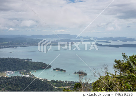 View of cloudy sky, sea and mountain seen from Cable Car, Langkawi, Malaysia 74629156