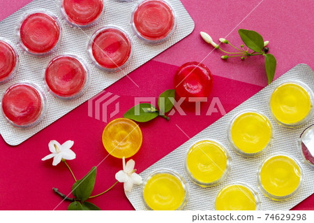 cough sore throat pastille colorful extract from herbal arrangement flat lay style cough sore throat pastille colorful extract from herbal arrangement flat lay style 74629298