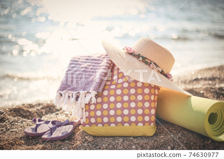 Summer photo of beach accessories on the beach 74630977