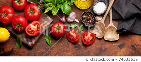 Italian cuisine ingredients. Tomatoes, herbs and spices 74633619