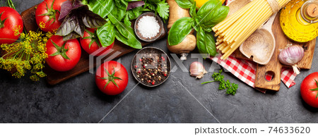 Italian cuisine ingredients. Tomatoes, pasta, herbs and spices 74633620