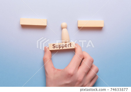 Support business concept with hand text and wooden block. 74633877