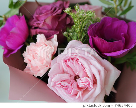 pink and violet rose anemon carnation bouquet close up pink and violet rose anemon carnation bouquet close up 74634403