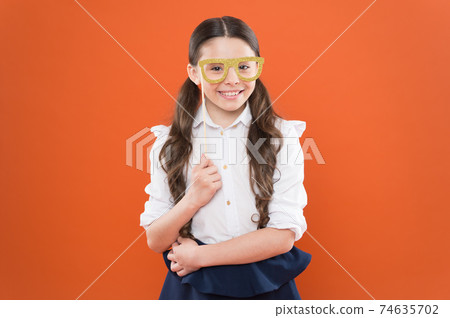 she is ready. school girl in uniform. child with party glasses. she is ready. school girl in uniform. child with party glasses. 74635702