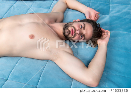 Being calm and relaxed. Single man after waking up  74635886