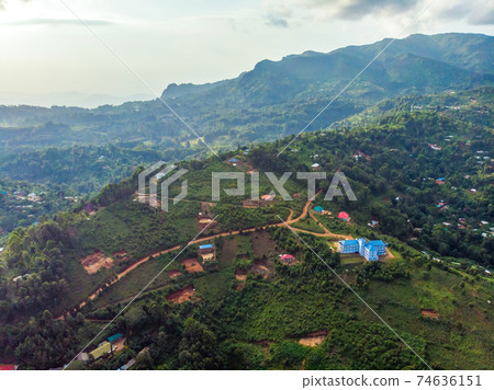 Aerial Drone Shot of Lushoto village in Usambara Mountains. Remote Place in Tanga Province, Tanzania, Africa Aerial Drone Shot of Lushoto village in Usambara Mountains. Remote Place in Tanga Province, Tanzania, Africa 74636151