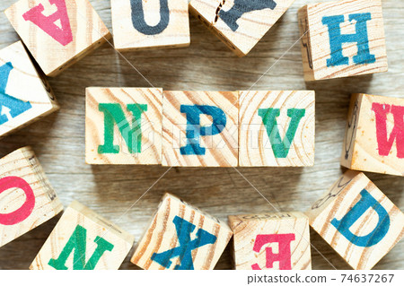 Alphabet letter block in word NPV (Abbreviation of net present value) with another on wood background 74637267