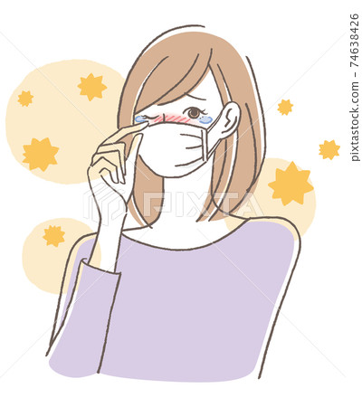 A woman with hay fever wearing a mask 74638426
