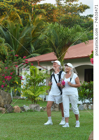 Portrait of elderly couple of backpackers. Travel 74638471