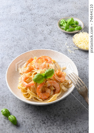 Italian pasta spaghetti with shrimps. Close up. Italian pasta spaghetti with shrimps. Close up. 74644110