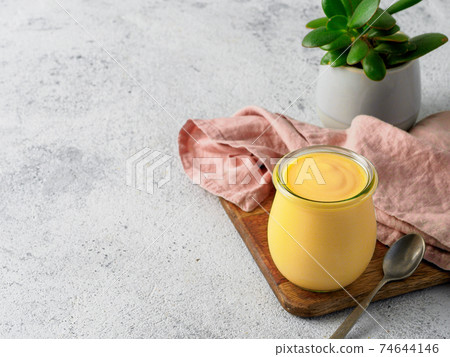 Mango Lassie - yogurt or smoothie with turmeric Mango Lassie - yogurt or smoothie with turmeric 74644146