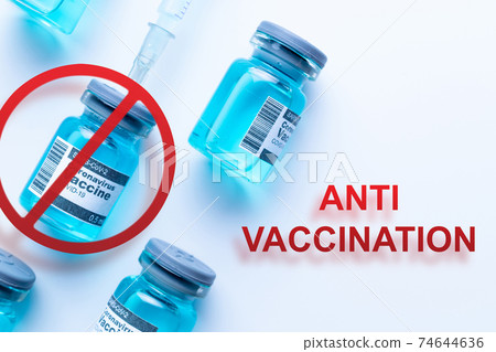 No covid vaccine. Red forbidden sign with Medical syringe, needle for protection flu virus and coronavirus. Anti Covid vaccine isolated on white. Disease care hospital prevention. 74644636