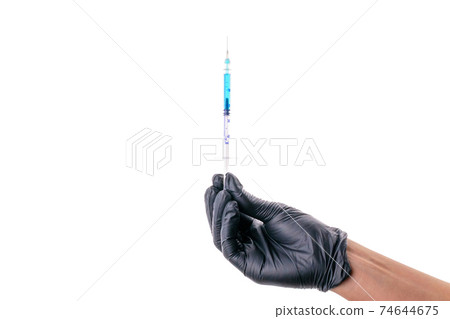 Vaccine isolated. Doctor hand in medical glove hold syringe with needle for protection flu virus and coronavirus. Covid vaccine isolated on white. Disease care hospital prevention. Vaccine isolated. Doctor hand in medical glove hold syringe with needle for protection flu virus and coronavirus. Covid vaccine isolated on white. Disease care hospital prevention. 74644675