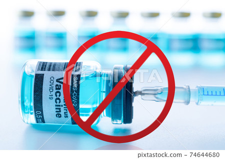 Stop vaccinations. Anti Covid vaccine isolated on white. Red forbidden sign with Medical syringe, needle for protection flu virus and coronavirus. Concept: diseases, medical care, science. Stop vaccinations. Anti Covid vaccine isolated on white. Red forbidden sign with Medical syringe, needle for protection flu virus and coronavirus. Concept: diseases, medical care, science. 74644680