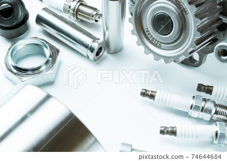 Sapre parts. Auto motor mechanic spare or automotive piece on white background. Set of new metal car part. Automobile engine service. 74644684