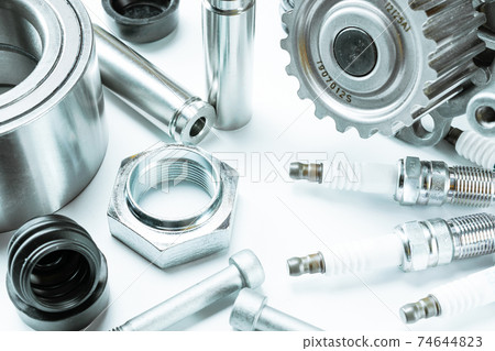 Part isolated. Set of new metal car part. Auto motor mechanic spare or automotive piece isolated on white background. Automobile engine service. Part isolated. Set of new metal car part. Auto motor mechanic spare or automotive piece isolated on white background. Automobile engine service. 74644823