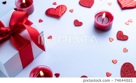 Valentines day heart, romantic gift box, red love candle on white background. Sainte Valentine, mothers day, birthday greeting cards, invitation, celebration concept. 74644881