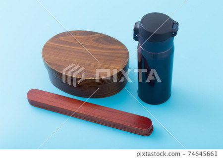 Lunch box and water bottle blue background shooting Lunch box and water bottle blue background shooting 74645661