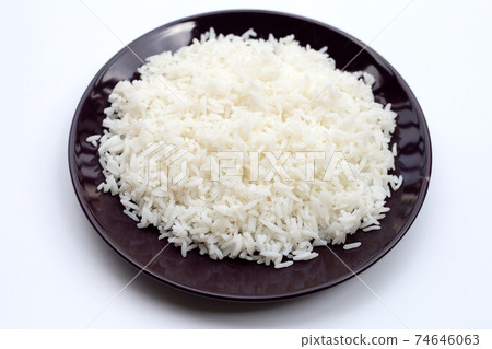 Dish of rice on white background. Dish of rice on white background. 74646063
