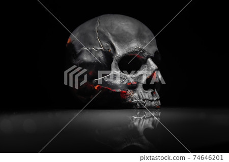 Spooky dark black skull aginast dark background Spooky dark black skull aginast dark background 74646201