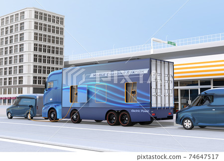 An image of a mobile charging truck equipped with a quick charger to charge an EV. EV power shortage road service concept An image of a mobile charging truck equipped with a quick charger to charge an EV. EV power shortage road service concept 74647517