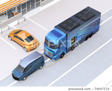 An image of a mobile charging truck equipped with a quick charger to charge an EV. EV power shortage road service concept An image of a mobile charging truck equipped with a quick charger to charge an EV. EV power shortage road service concept 74647519