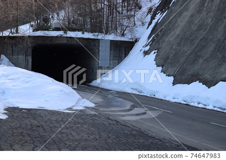 Snowy roads and tunnels Snowy roads and tunnels 74647983