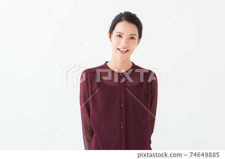 photo of a woman wearing a red blouse 74649885