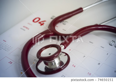 World Health Day Concept. Stethoscope on 7 April calendar World Health Day Concept. Stethoscope on 7 April calendar 74650151