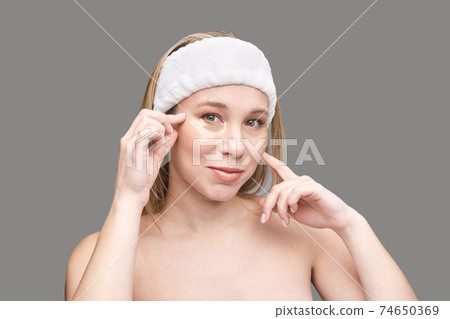Eye patch procedure. Facial treatment. Dermatology spa. Detox therapy Eye patch procedure. Facial treatment. Dermatology spa. Detox therapy 74650369