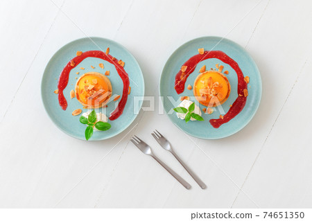 Roasted Peaches, tasty fresh fruit dessert with lemon, lime and basil creme fraiche and raspberry coulis. Roasted Peaches, tasty fresh fruit dessert with lemon, lime and basil creme fraiche and raspberry coulis. 74651350