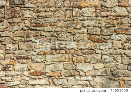 Close up of the stone brick wall. Natural pattern with high resolution for background and design art work. Close up of the stone brick wall. Natural pattern with high resolution for background and design art work. 74651409