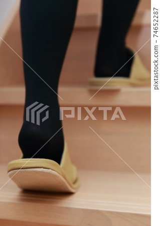 Women's legs climbing stairs Women's legs climbing stairs 74652287