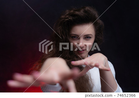 Happy, curly, smiling, Self-Assured Woman On Isolated Background. 74652366