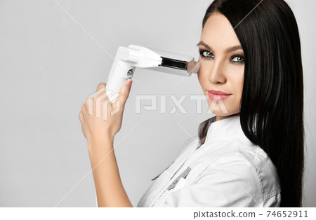 Portrait of young brunette woman doctor Portrait of young brunette woman doctor 74652911
