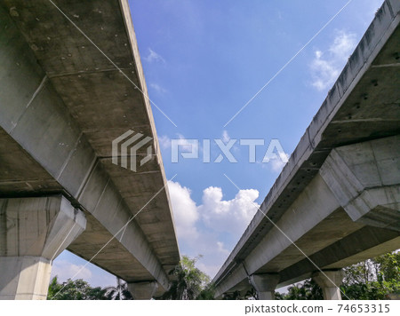 A stunning view of the highway underneath the expressway is ideal for travel or class illustrations. 74653315