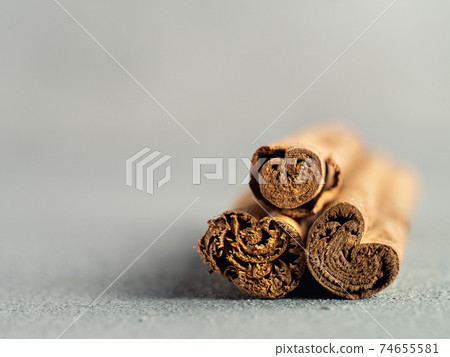 ceylon cinnamon sticks on gray background ceylon cinnamon sticks on gray background 74655581