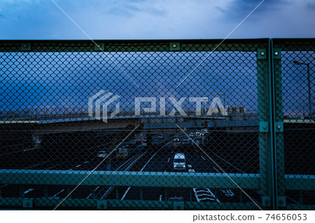 Highway floating on an ultramarine fence 74656053