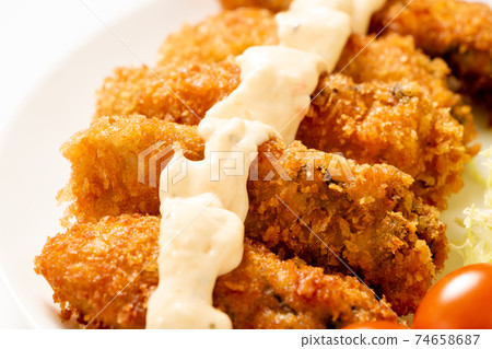 Fried oysters with tartar sauce. Fried oysters with tartar sauce. 74658687