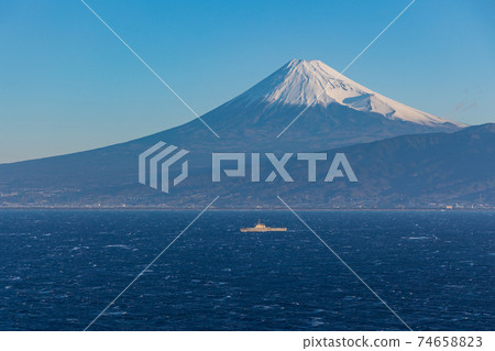 (Shizuoka Prefecture) Mt. Fuji over the sea, a warship sailing in Suruga Bay where strong winds blow (Shizuoka Prefecture) Mt. Fuji over the sea, a warship sailing in Suruga Bay where strong winds blow 74658823