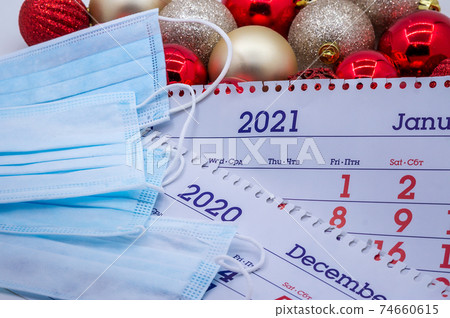 mask mode 2021, calendar and New year, new year toys and medical mask, planning for the next year 74660615
